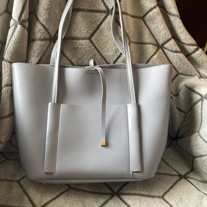 Light blue/purple purse or bag